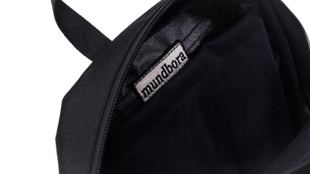 Mundbora label inside an open body shield bag